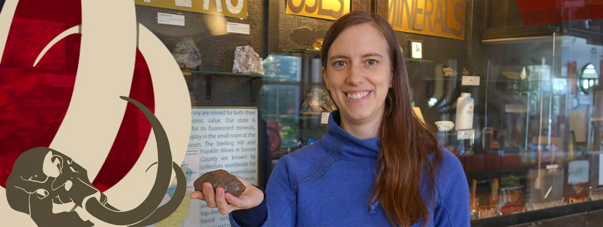 Teacher with geology display